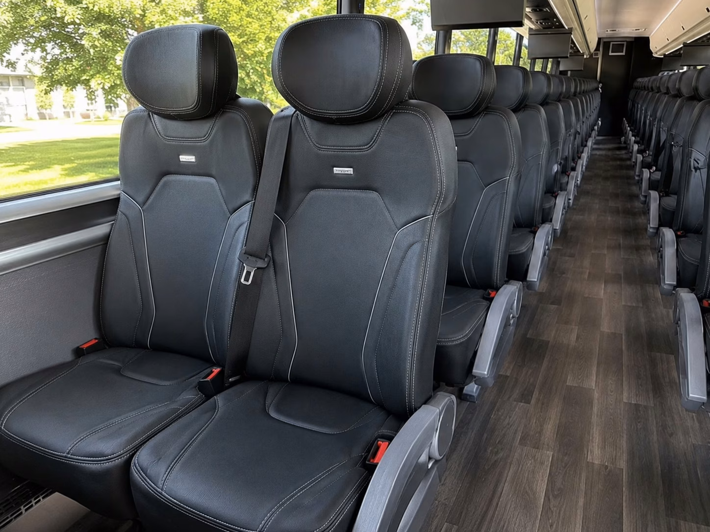 how trip distance and duration affect charter bus rental rates in denton